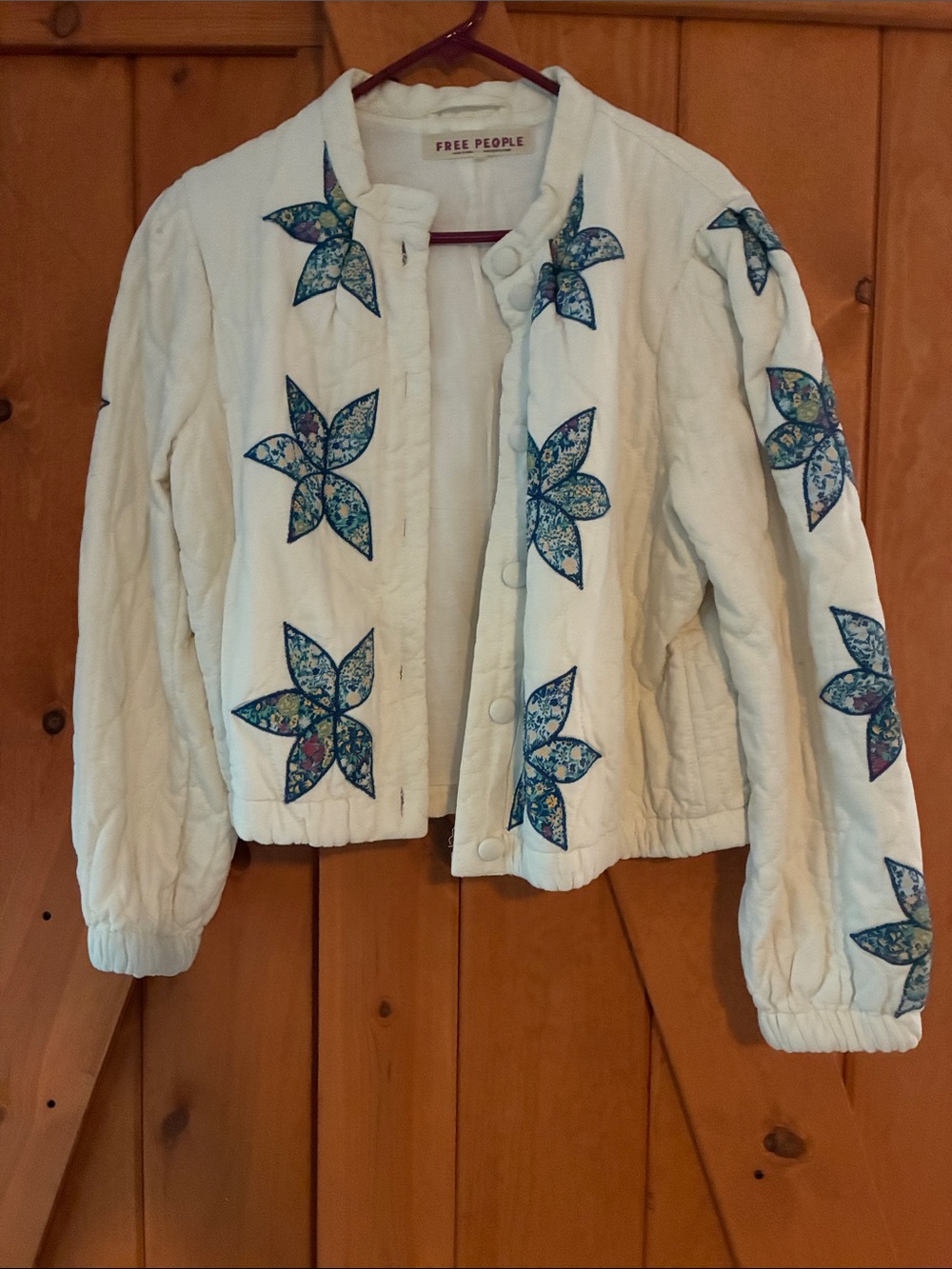 Free People White Quilted Jacket with Blue Floral Star Appliquรฉs